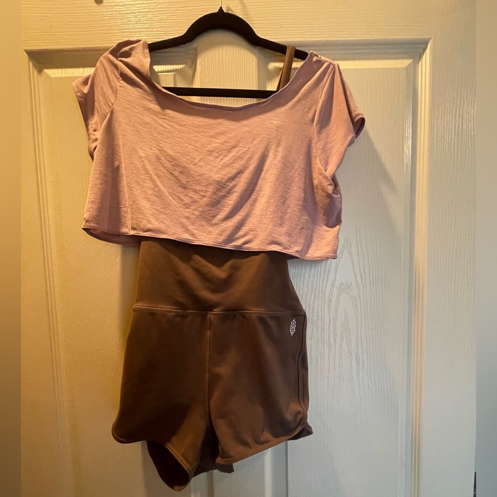 Free people movement pink and brown workout romper.